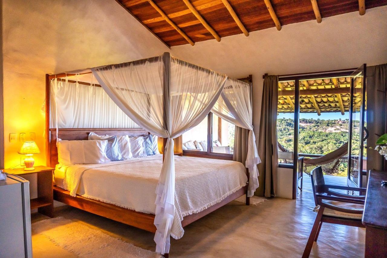 Quarto com Cama King-size e Vista do Mar
