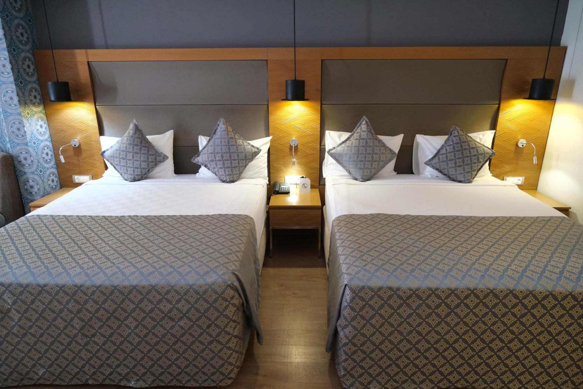 Luxe Kamer met 1 of 2 Bedden en Balkon