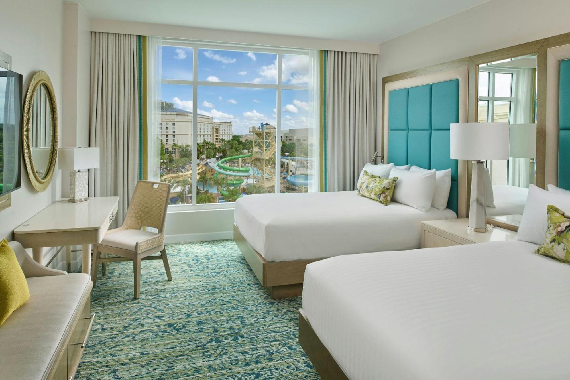 Two Queen Beds Water Park View Gulf Coast Tower or Mobility Accessible Roll Shower