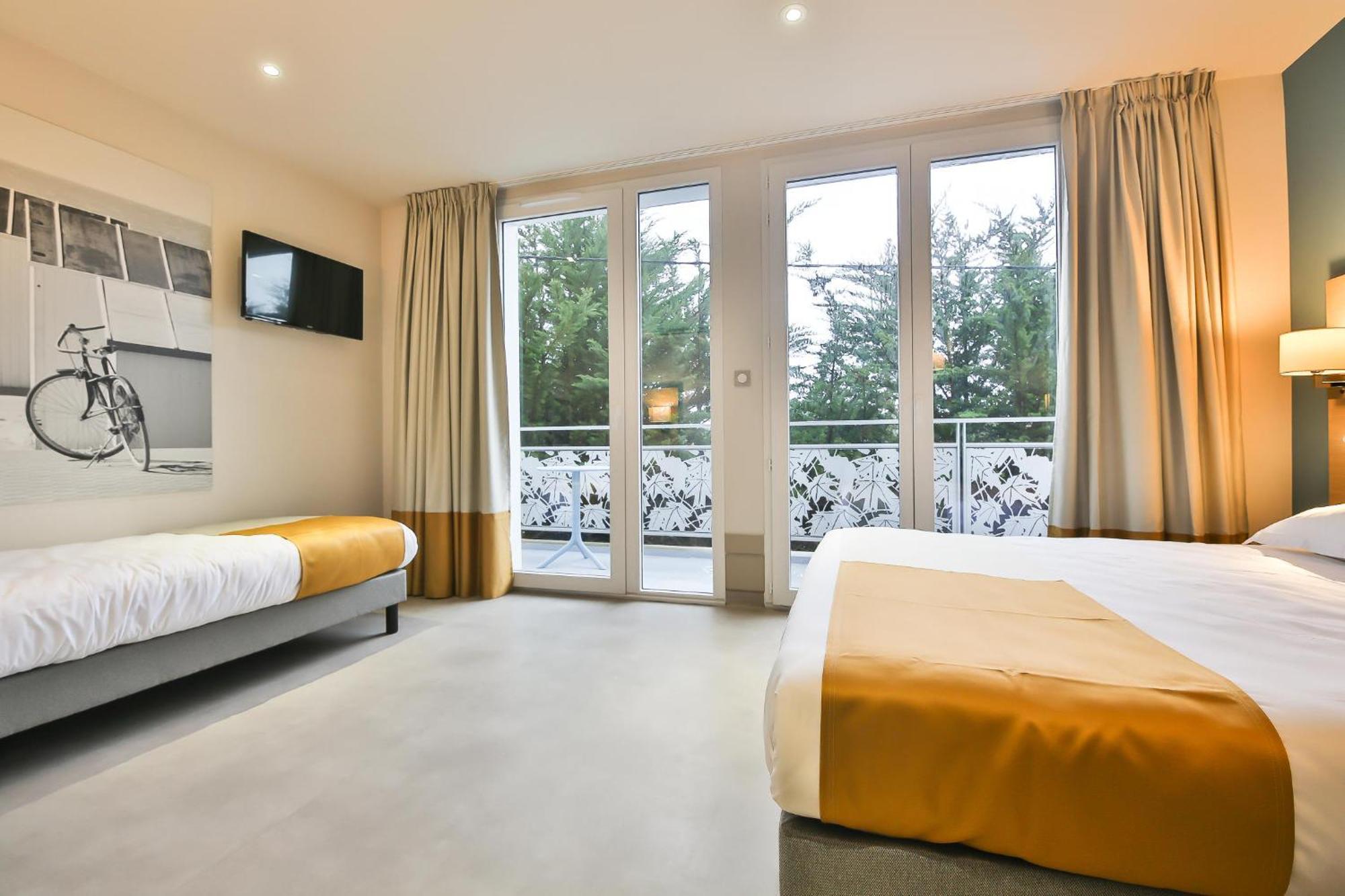 Chambre Triple avec Balcon